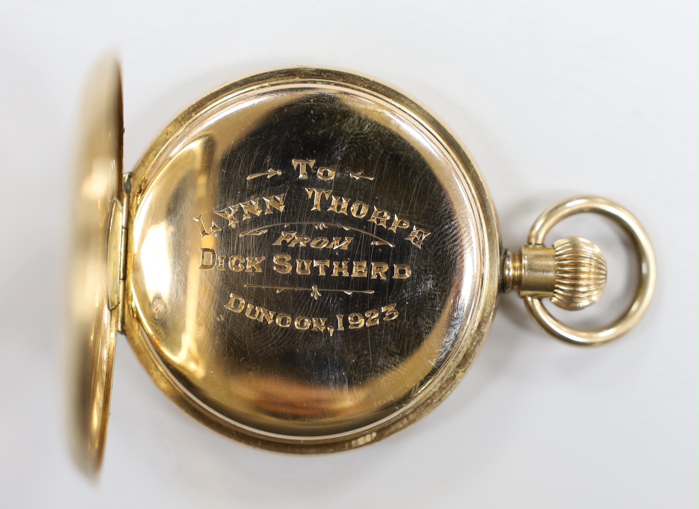 An Elgin gold plated keyless hunter pocket watch, with Roman dial and engraved interior inscription.